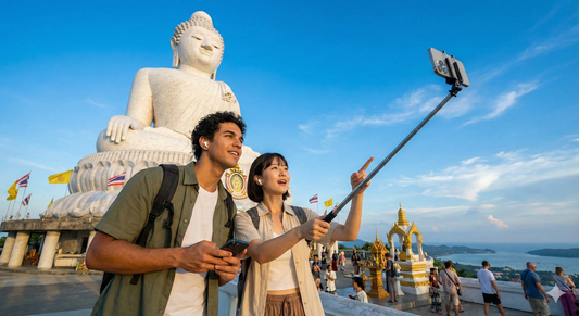 Phuket self-guided audio tour by Uvamai Niche Tourism featuring a large Buddha statue in a scenic outdoor setting.