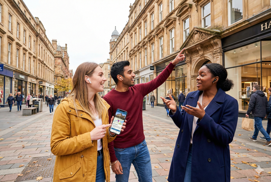 Self-guided audio tour of Buchanan Street in Glasgow by Uvamai Niche Tourism. Image shows busy shopping street scene.