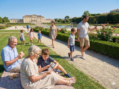 Self-guided audio tour of Marseille by Uvamai Niche Tourism, showing a scenic view at Parc Borely with lush greenery and pathways.