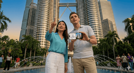 Kuala Lumpur self-guided audio tour by Uvamai Niche Tourism, showing a cityscape with iconic skyline and landmarks.