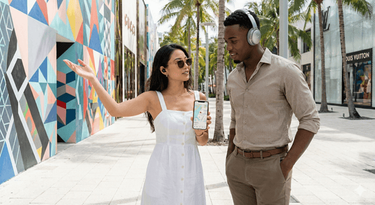 Miami Self-Guided Audio Tour by Uvamai Niche Tourism, featuring a smartphone with the tour app and scenic Miami landmarks.